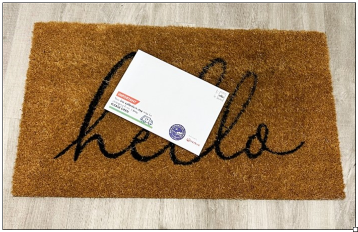 Image of letter arriving on doormat
